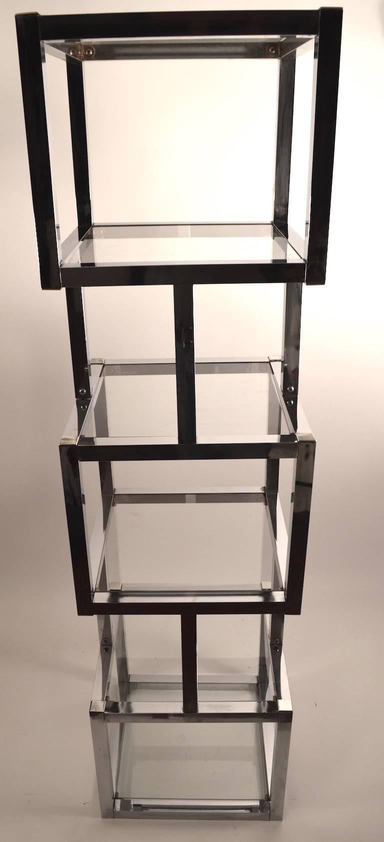Stacked chrome cubes with glass shelves - each 