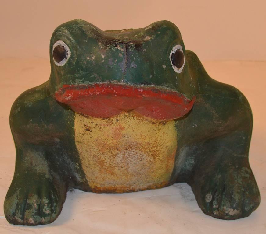 Cement frog in wonderful old paint finish. This on is the largest one I've seen, garden frog, toad sculpture.