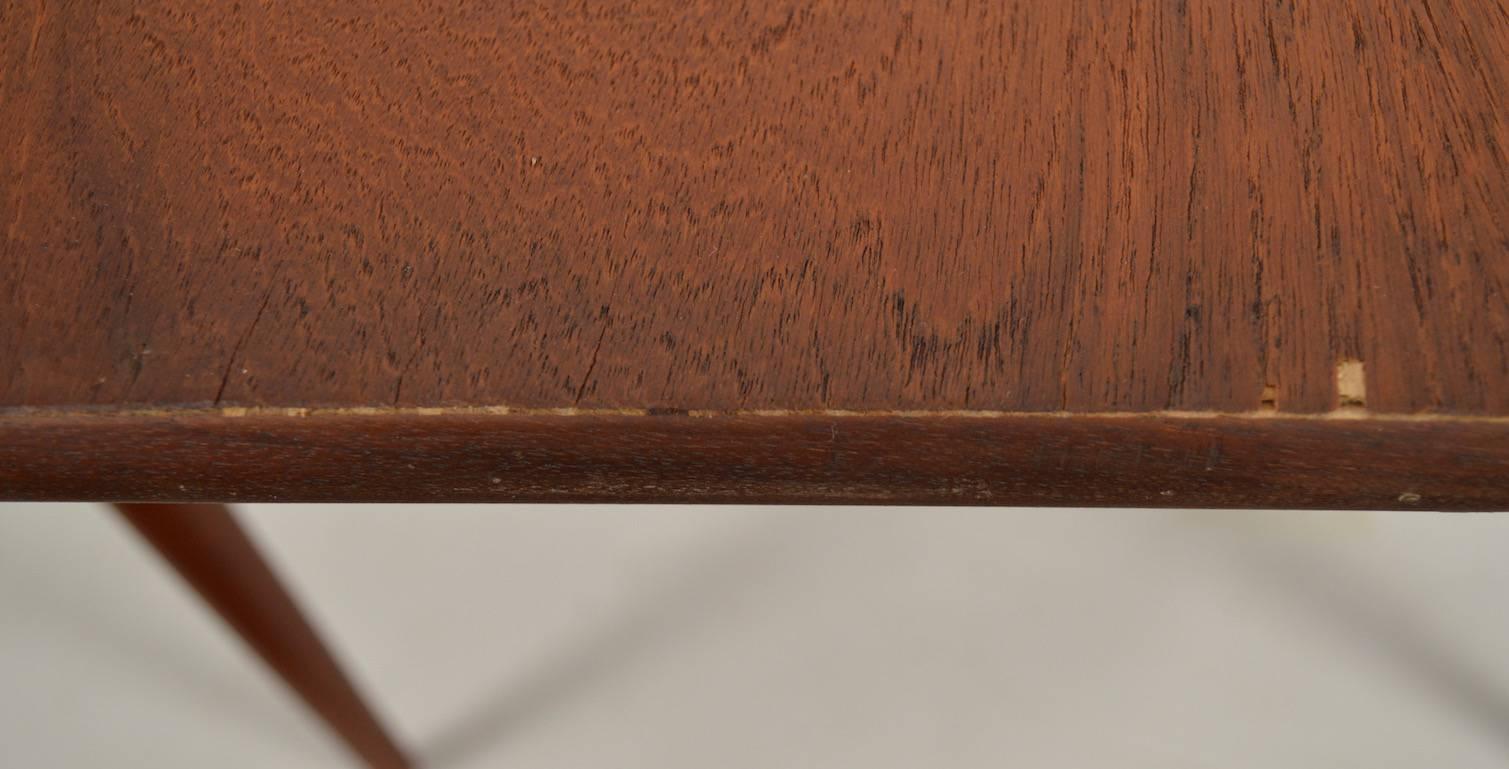 Round teak dining table with one 24