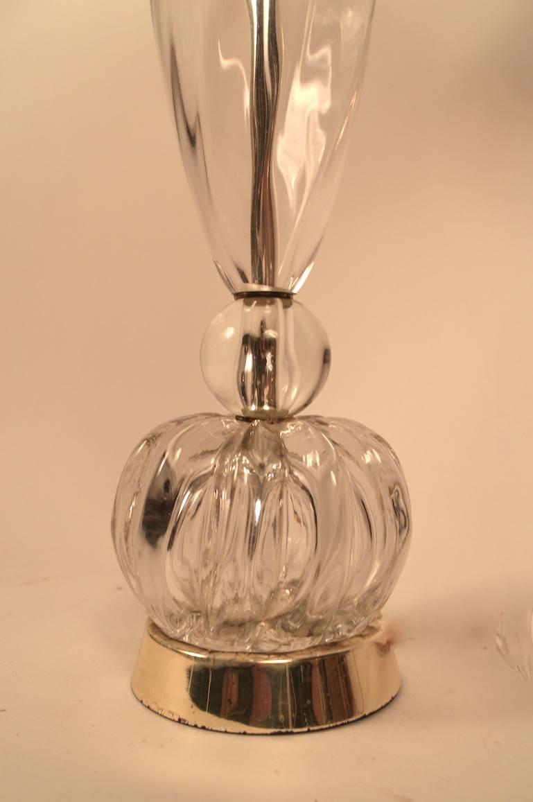 Stylish and elegant pair of crystal lamps, in very good, original, working condition. One lamp retains the 