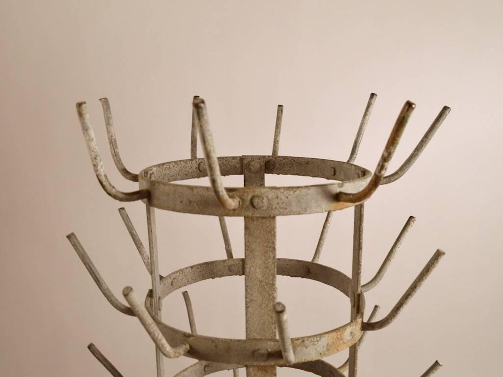 Industrial style French wine bottle drying rack. Chic style, sculptural and functional as well.