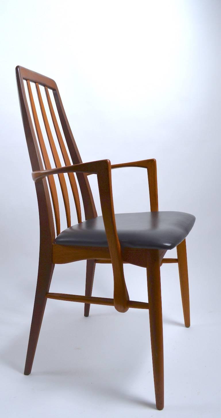 Interesting example of the Classic Eva chair by Niels Kofoed for Kofoed Mobilfabrik. This chair has a rosewood back, back legs and back slats, the rest of the chair is teak, we believe. Armchairs from this series are hard to find. Measures: Arm