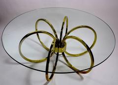 Table basse en laiton et verre d'après Milo Baughman