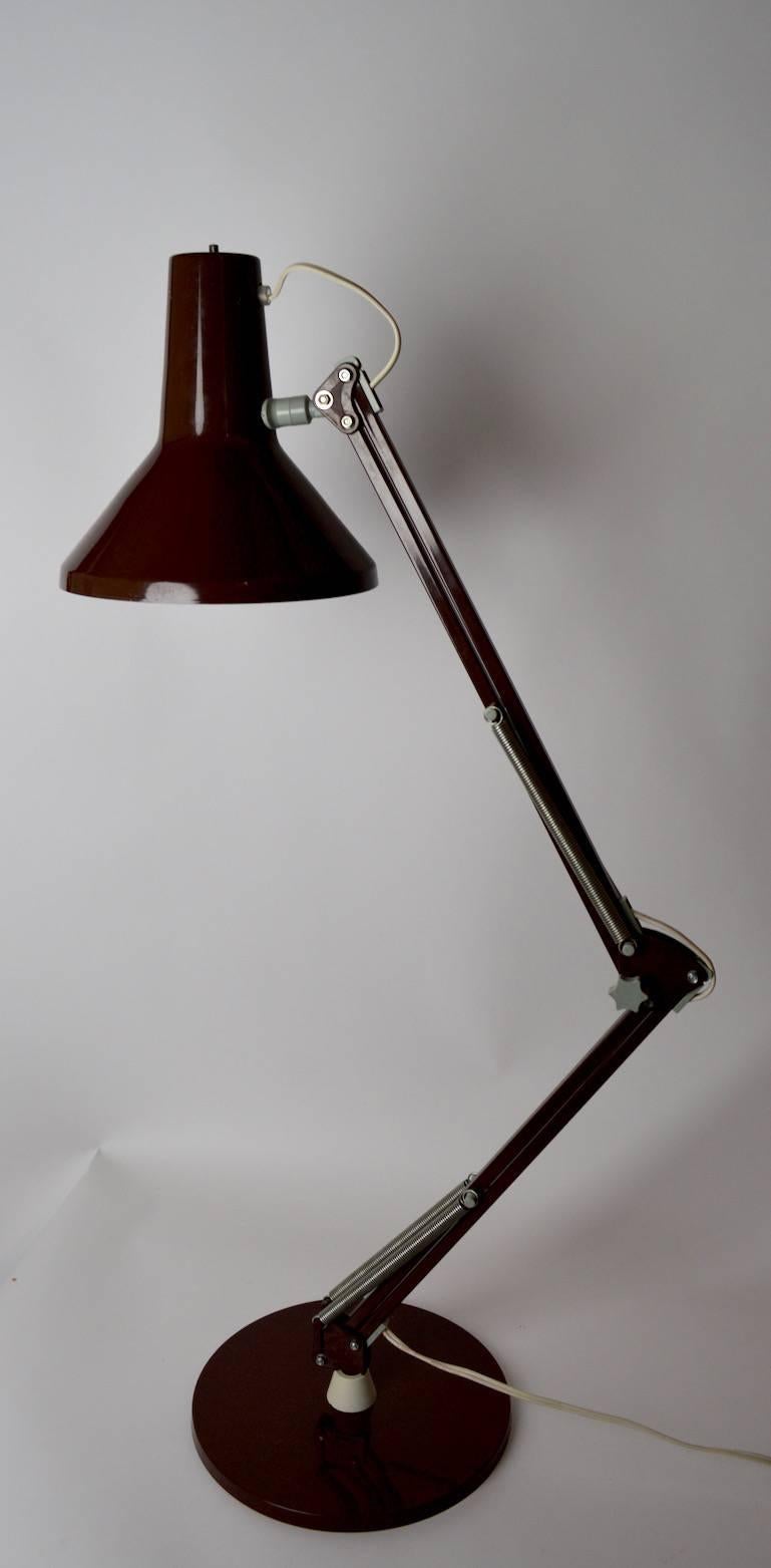 Very nice example Danish Anglepoise desk, work, task lamp.
The lamp is in original chocolate brown enamel paint finish, working, clean, and original. Each section of the arm measures 15