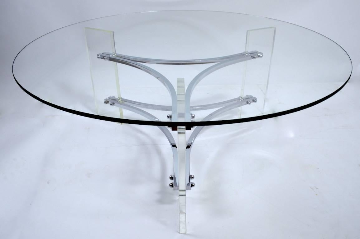 Nice round glass top coffee table with Lucite and chrome base. Clean, original ready to use condition, Lucite legs show minor scuffs at bottom, normal and consistent with age. Measures: Top 3/8 thick.