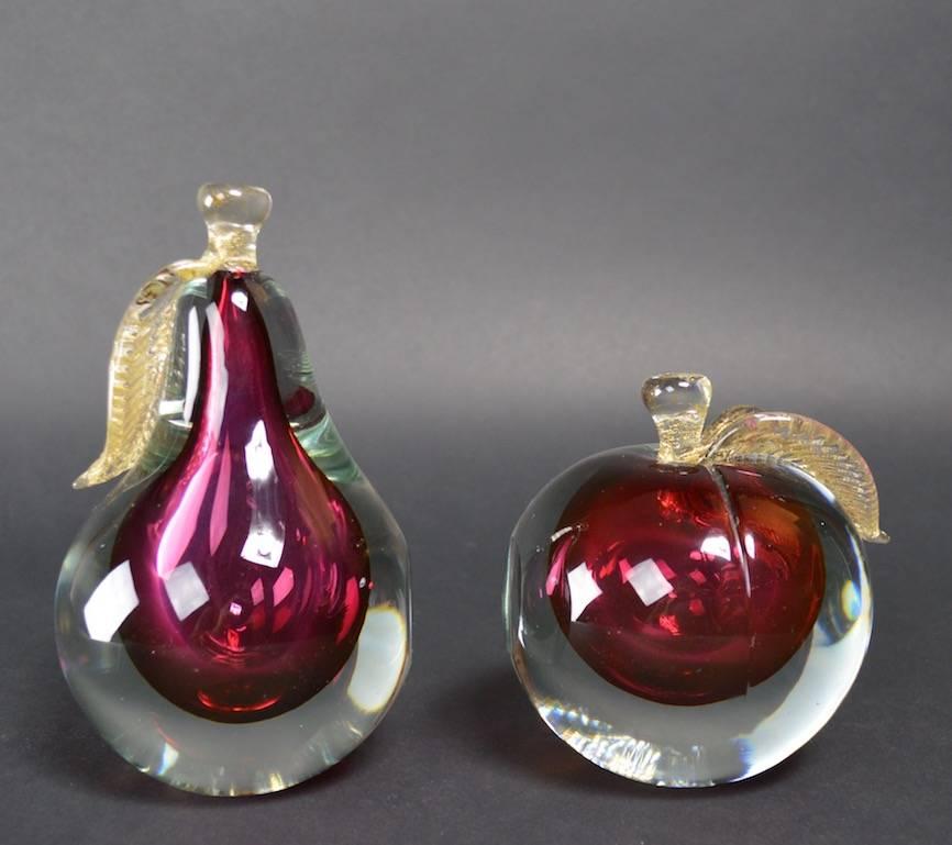 Barbini glass fruit bookends done in the Sommerso technique. Both in perfect condition. Smaller piece (Apple ) 5