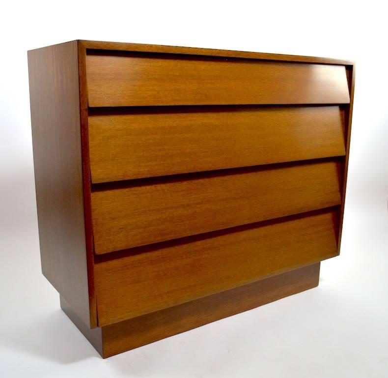 Excellent pair of Bachelors chests, also suitable for use as large nightstands. Nice deep drawers provide ample storage. Professionally refinished to perfection, high quality cabinetry, design influenced by Florence Knoll. Offered and priced as a