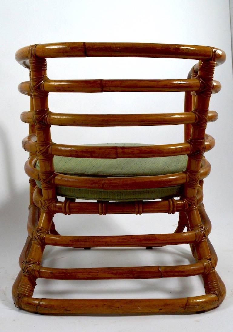 Chic and sexy pair of bamboo chairs by 