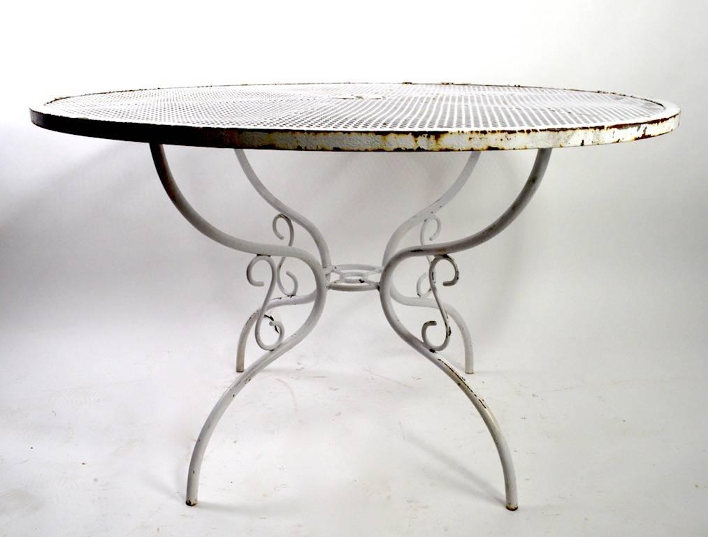 Woodard Wrought Iron Dining Table with Scroll Decorated Base In Good Condition In New York, NY
