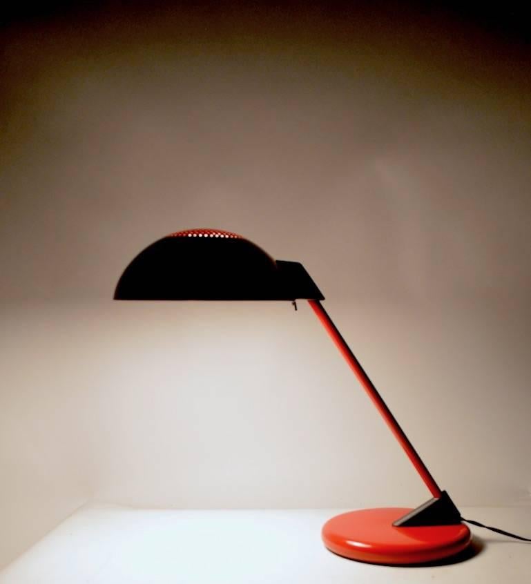 Stylish modernist red and black desk lamp, probably American in the Italian style. Working, clean original condition.