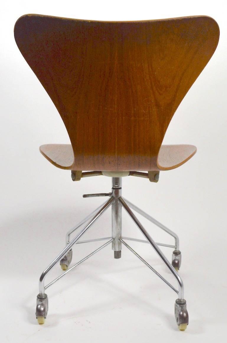 swivel chair with desk attached