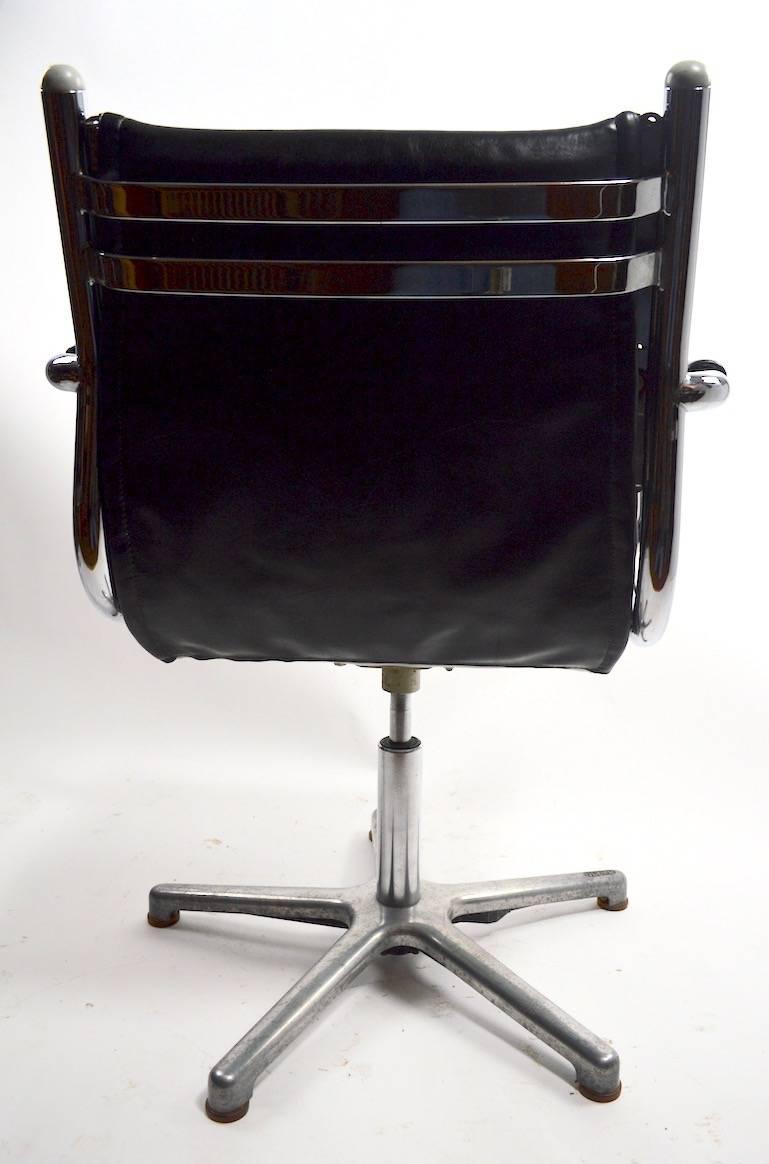 Four Chrome and Black Swivel Chairs by Olymp In Good Condition In New York, NY