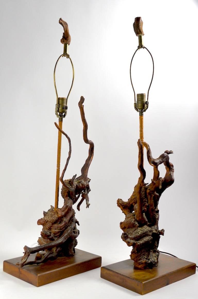 Interesting pair of driftwood lamps in great and unusual dark finish. Both lamps are in very good, original, working condition.