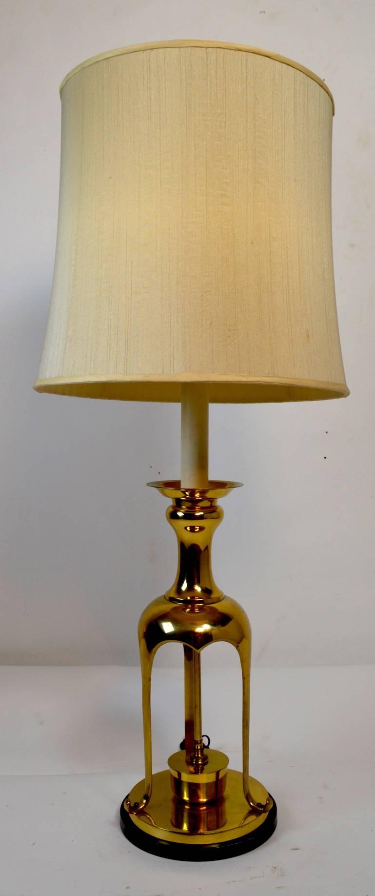 Stylish and clean brass table lamp in the Asian Modern style. We believe this lamp is by Chapman, however it is unmarked. Shade not included.