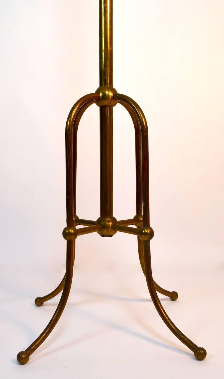 Victorian stick and ball style brass coat tree stand, with four hooks. This example is sturdy and ready to use, the finish shows minor wear, normal and consistent with age.