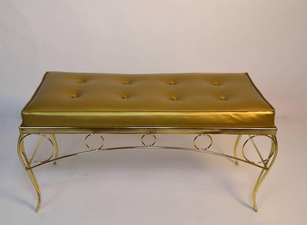 Glam gold and brass bench manufactured by George Koch and Sons. This bench is an example of American midcentury working class glamor style.