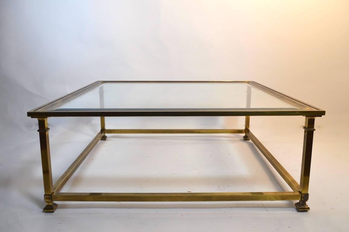 Brass picture frame style frame supports original beveled glass top. Elegant modernist expression of classical style, fine construction and quality as expected from Mastercraft Furniture. Excellent original condition, clean, ready to use.