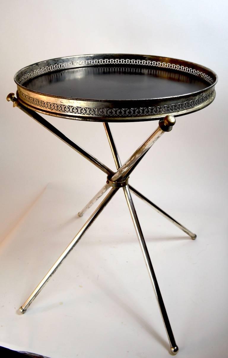 Tripod base with removable tray top surface, Made in Italy. Butler tray top serving stand, table, in good original condition. Finish shows some signs of wear, normal and consistent with age.