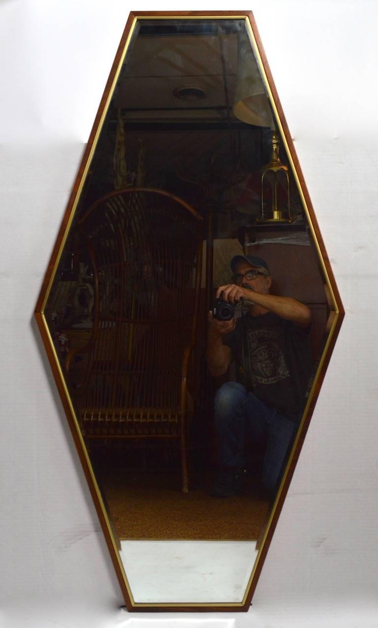 Nice pair of walnut framed bevelled glass diamond form wall mirrors designed by Helen Hobey for Baker Furniture.
Very decorative, and chic, clean ready to use condition (brown paper backing peeling). Hard to find matching pairs of mirrors, great
