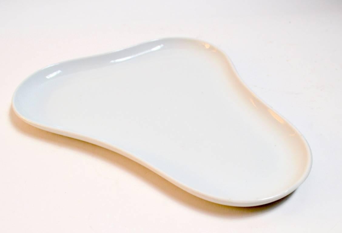 Unusual white on white pin tray by Royal Copenhagen. Modernist free form shape, minimalist undecorated motif, fully marked with RC mark on verso.