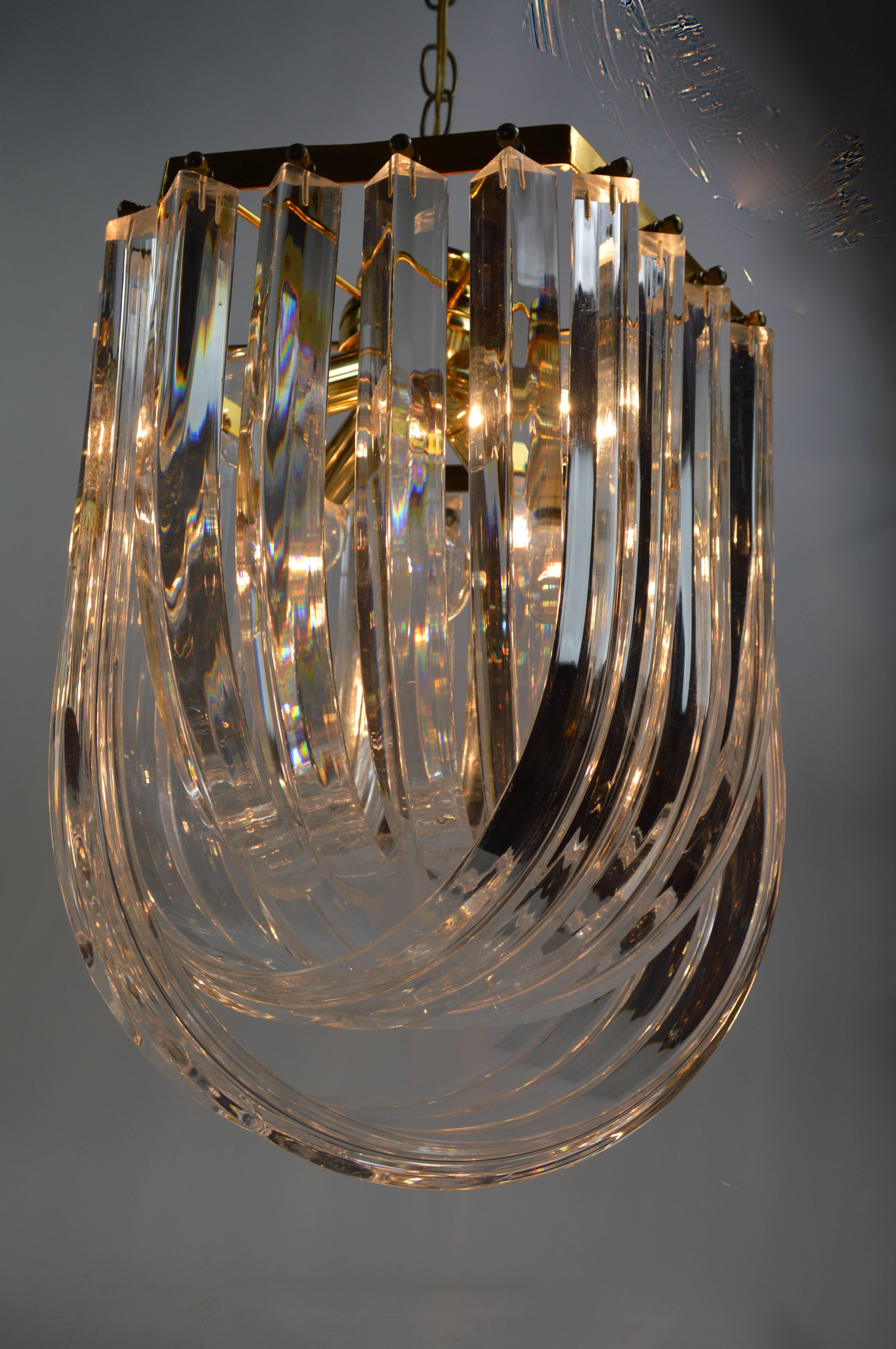 Mid-Century Modern Brass and Lucite Swag Chandelier For Sale