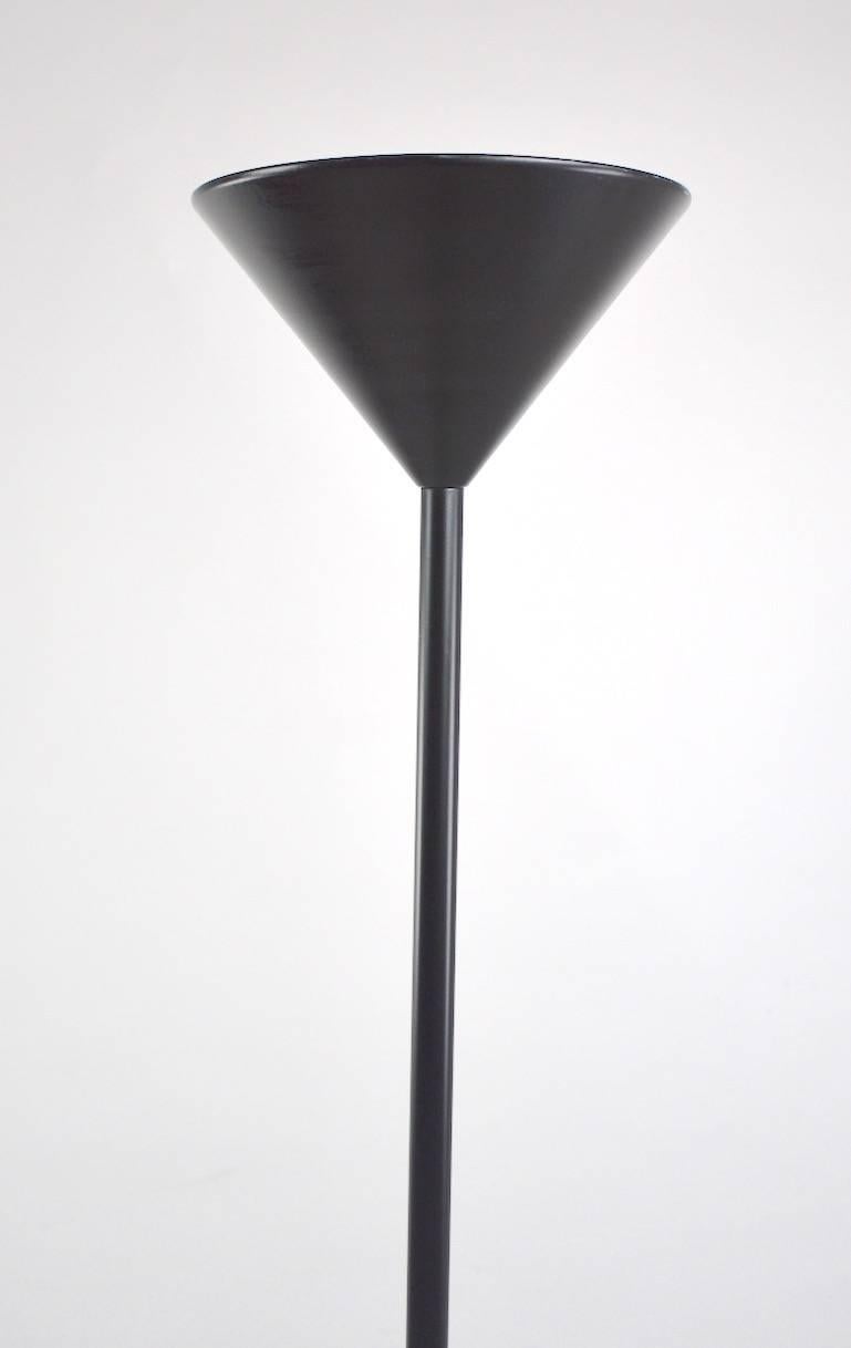 Postmodern Italian design halogen Torchieres. Bold all black graphic design, statement floor lamp, in clean, working, original condition. 8 inch diameter of top shade.
  