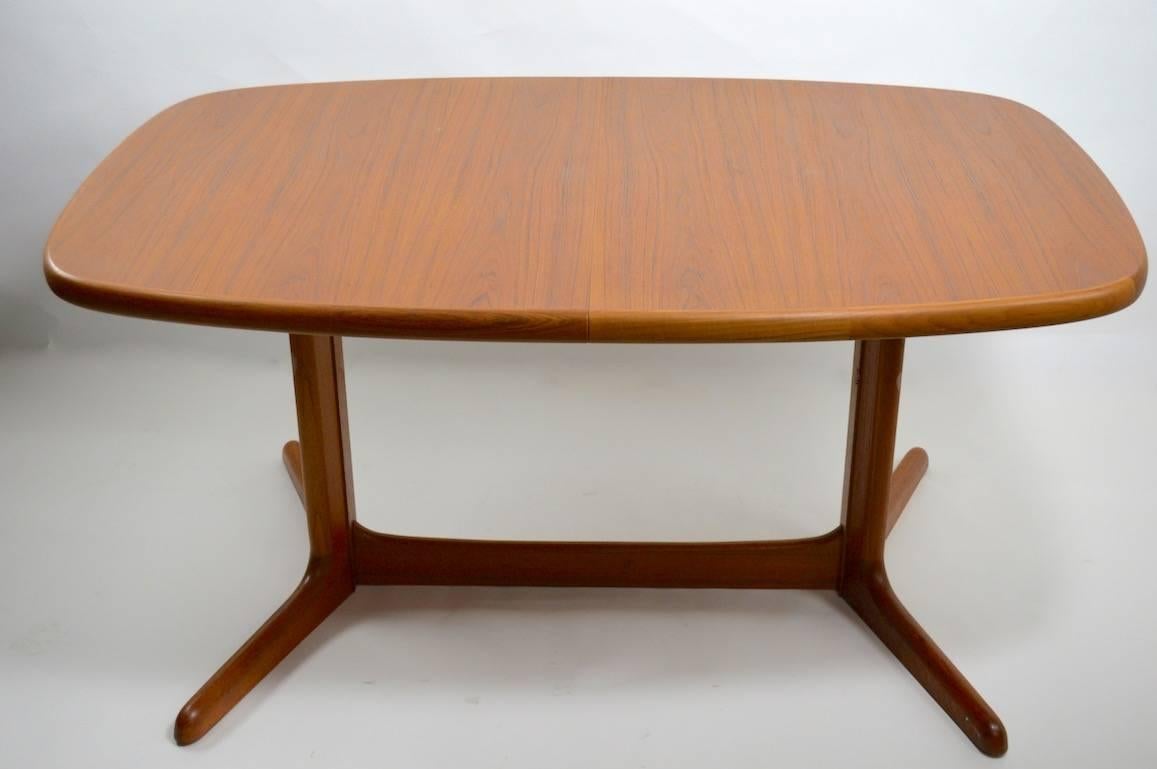 Teak Danish Dining Table with Two Leaves In Excellent Condition In New York, NY