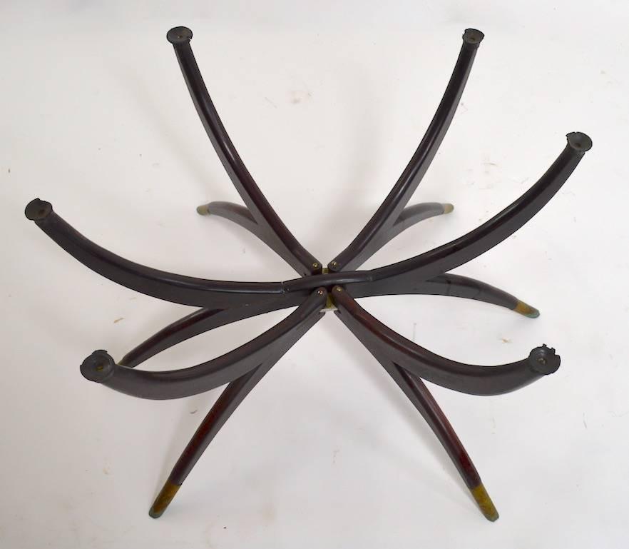 Midcentury Moroccan made brass tray top table with folding spider leg base. This example shows some minor cosmetic wear, normal and consistent with age.