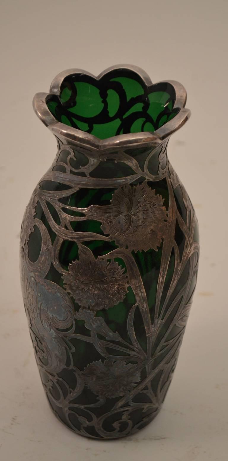 High quality silver overlay emerald glass vase, in excellent original condition. Monogramed medallion, as shown.