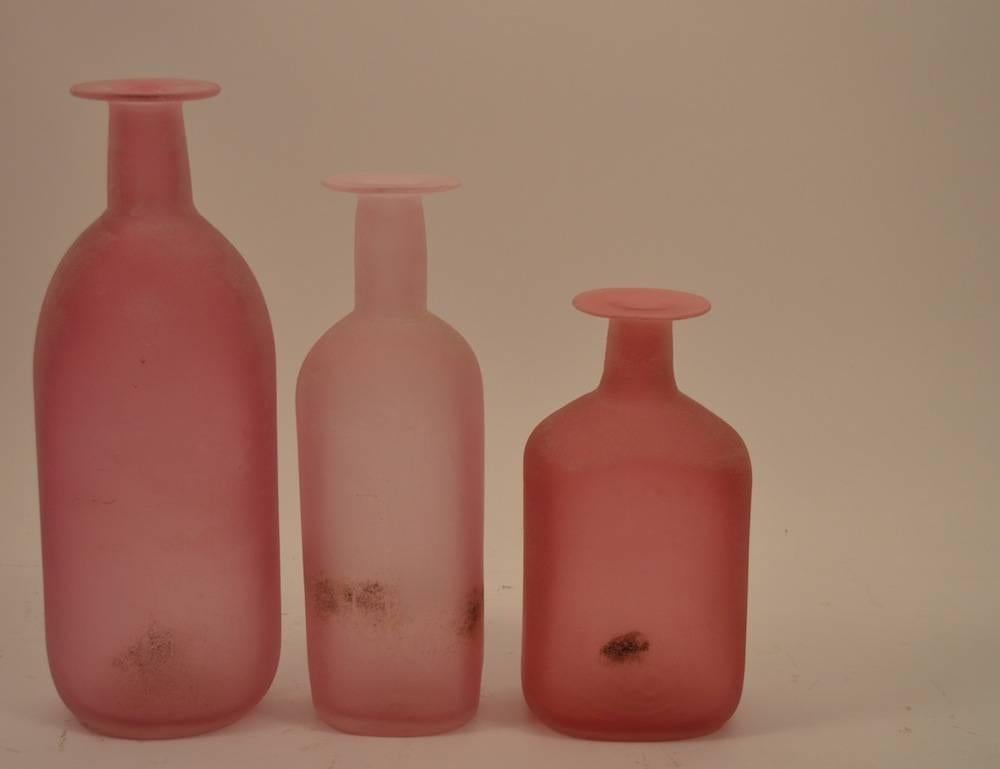 Three vintage Cenedese vases, done in the Scavo finish. Each is a different shade of pink, all have labels, and are in perfect condition. Dimensions in listing are for the tallest, middle size: 13.5