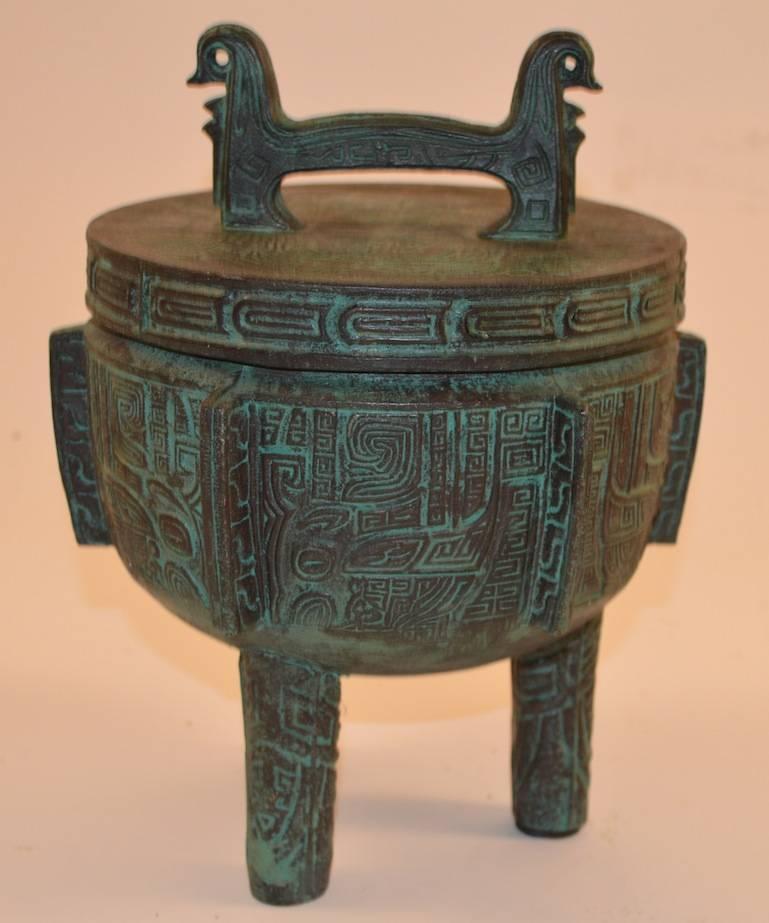 Copper clad with Verdi Gris finish, Mayan style decorations attributed to James Mont. Nice Clean original condition. Marked on the bottom 