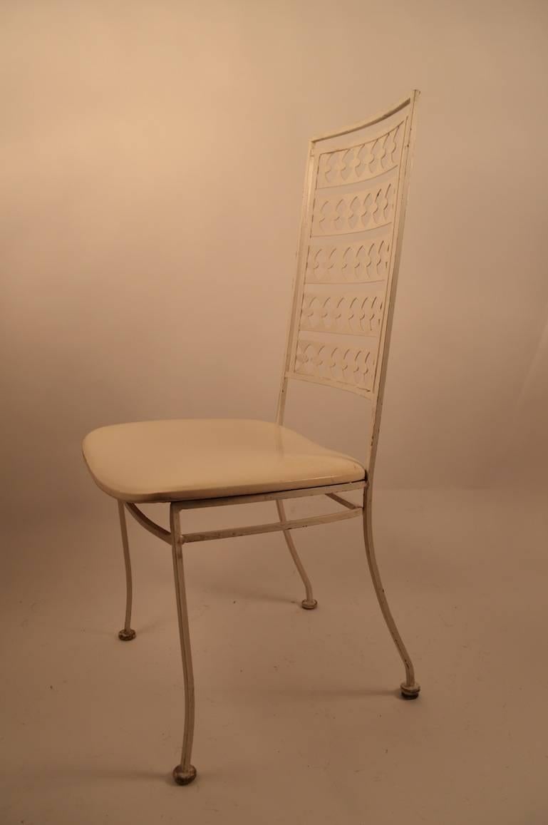 Mod style side chairs with nice high backs and wide upholstered seats. Manufactured by 