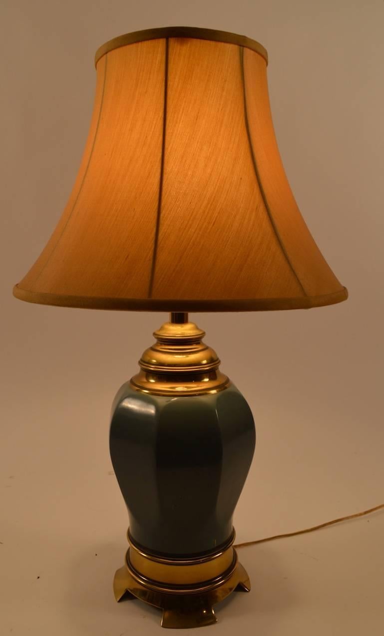 Pair Asia Modern style table lamps, dark green enamel bodies, with brass base and fitments. Some minor scratches to the body, working, clean original condition, shades not included. Height to top of socket 20