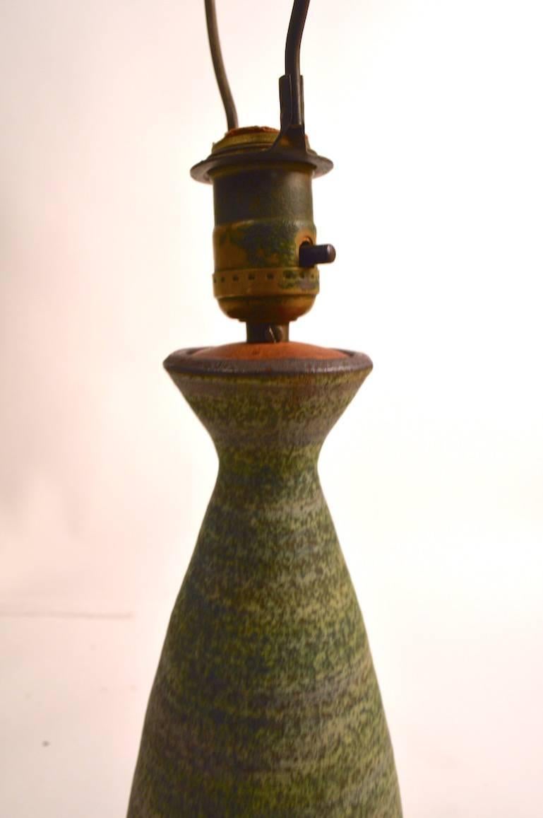 Elegant form, great glaze, original, working condition Art Pottery Lamp. Clean, original, working condition. Height to socket 18