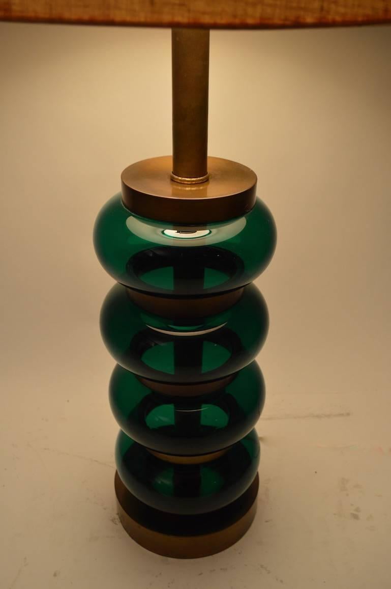 Green glass orbs with brass disk spacer disks, impressive and chic table lamp by Paul Hanson. Working, clean, original condition. Glass diffuser shade included, vintage paper shade, not included. Height to top of disks 19.5