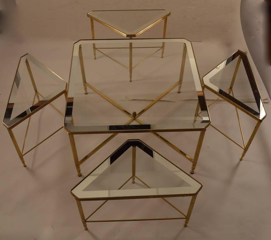 Five piece nesting tables brass frames with mirrored tops In Excellent Condition In New York, NY