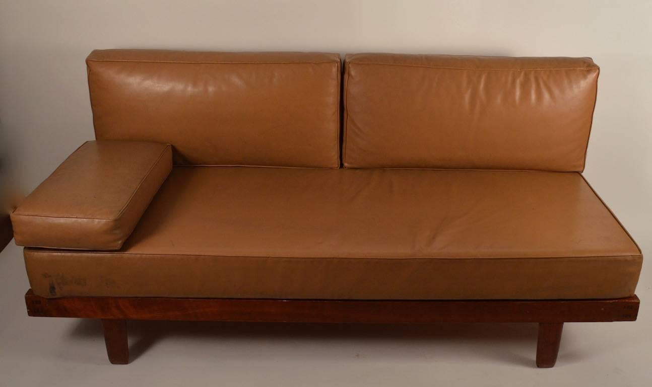 Hard to find iconic design, daybed by George Nakashima for Widdicomb. This example is in original condition, it shows some minor cosmetic wear, normal and consistent with age, height to cushion 16.5