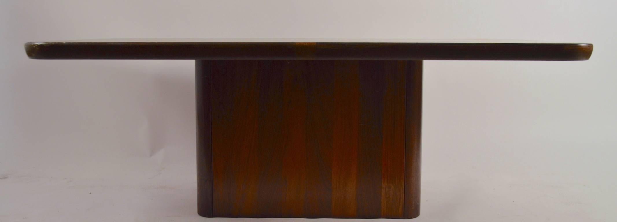 Mod rosewood coffee table by Jensen Frokjaeras. This example shows some cosmetic wear, normal and consistent with age. Top 1.5