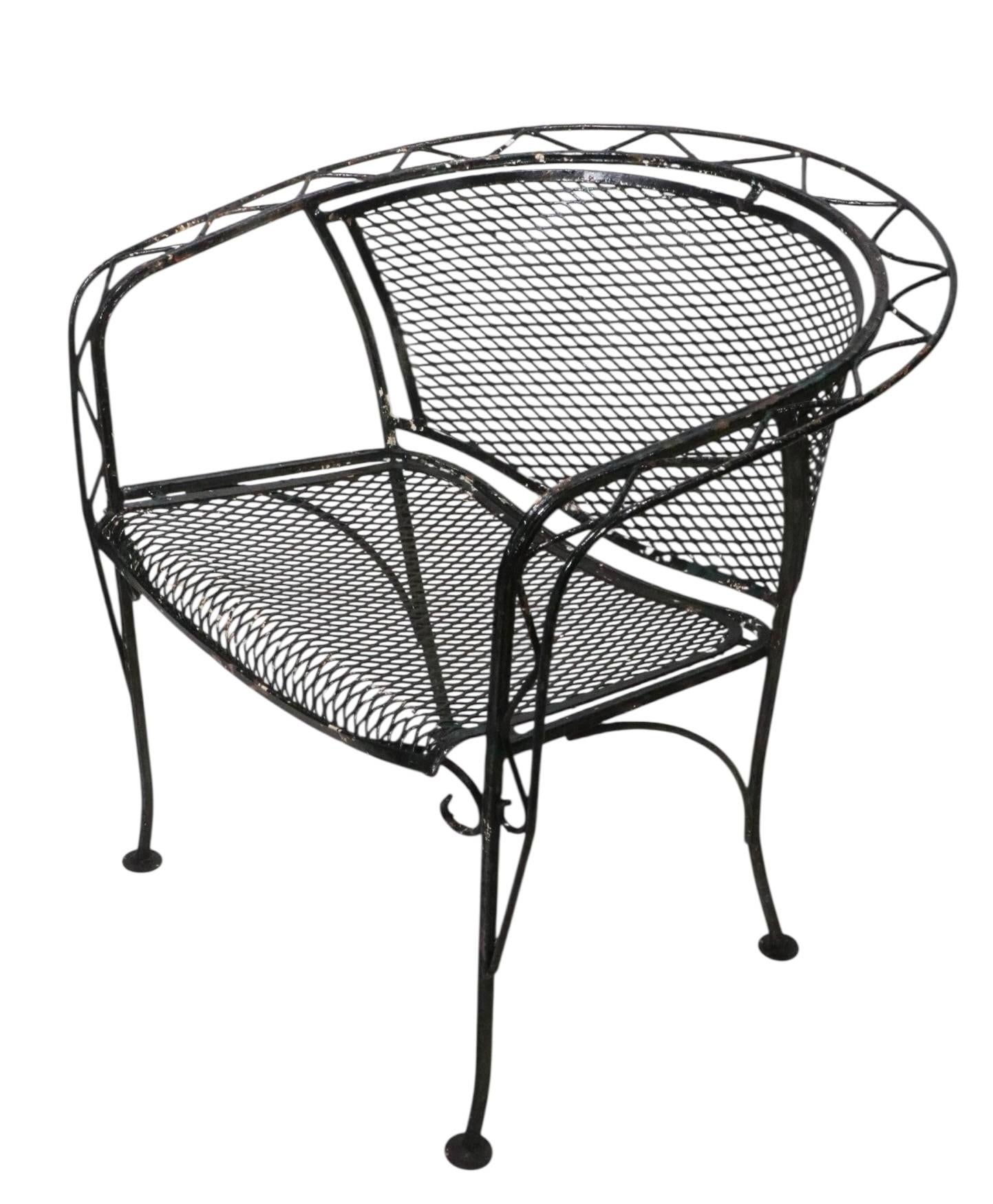 Vintage Zig Zag pattern  wrought iron and metal mesh garden, patio, poolside chair by Salterini. This chair is in very good condition, structurally sound and sturdy, it is currently in black paint finish, which shows significant wear, please see