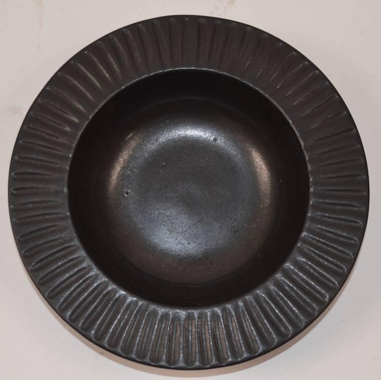 Mid-Century pottery bowl in matt black glaze by noted Seattle potter, 