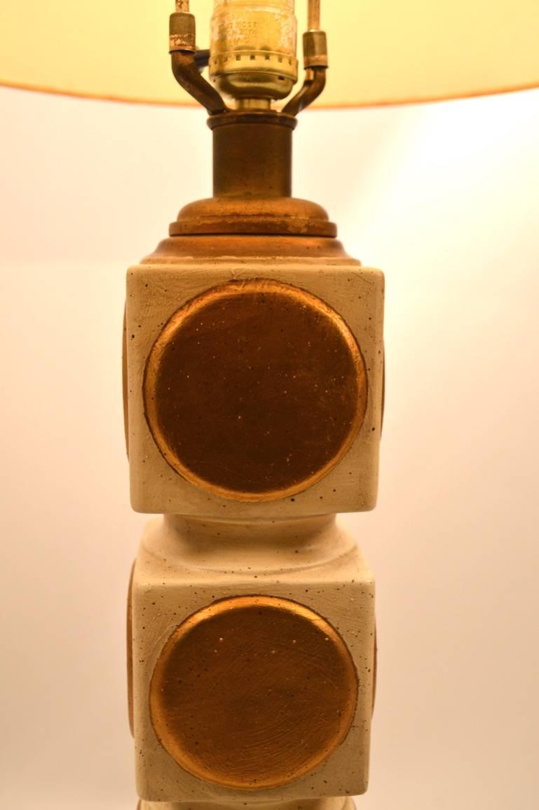 Four stacking cubes with gold dot motif. Painted plaster and metal base, working, clean, original condition, shade not included. Height to top of socket 26