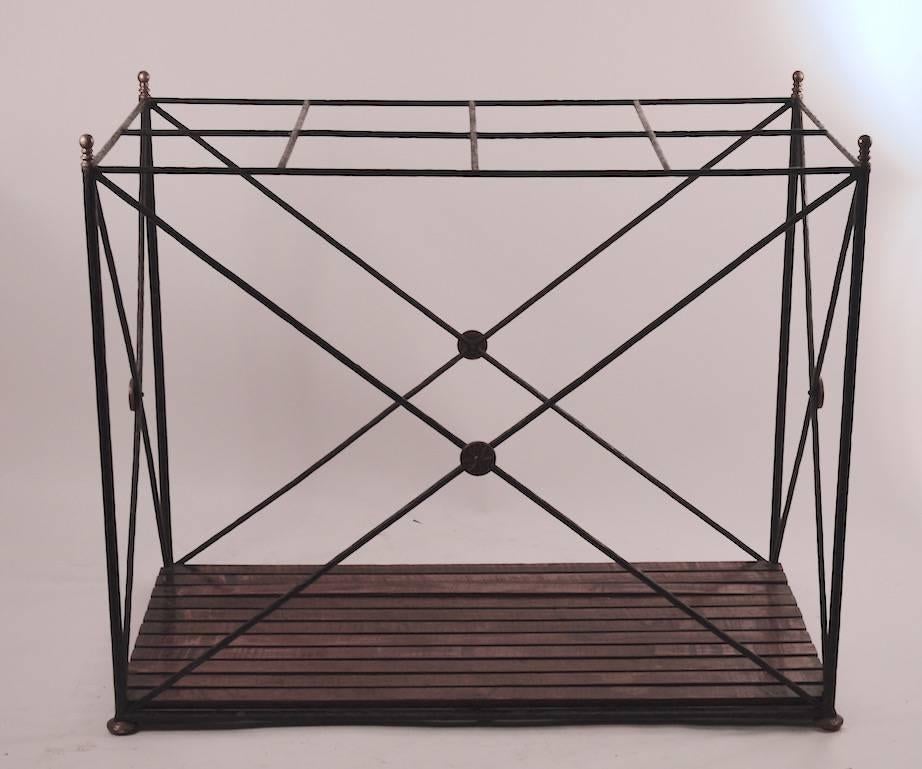 Unusual classical revival style textured wrought iron, brass and oak plank cane or umbrella stand. Originally from a store in Philadelphia, large scale example with eight 9