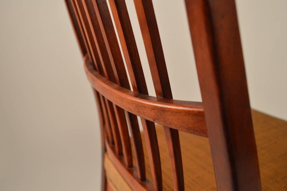 Classic Danish modern (Swedish) Cortina dining chairs, designed by Svante Skogh for Seffle Mobelfabrik Stockholm, Sweden. I believe the chairs are rosewood, however they could be walnut with a dark stain. Original finish and upholstery still intact.