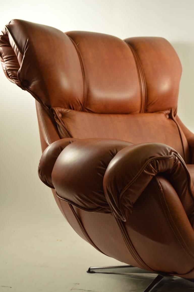 overstuffed swivel chair