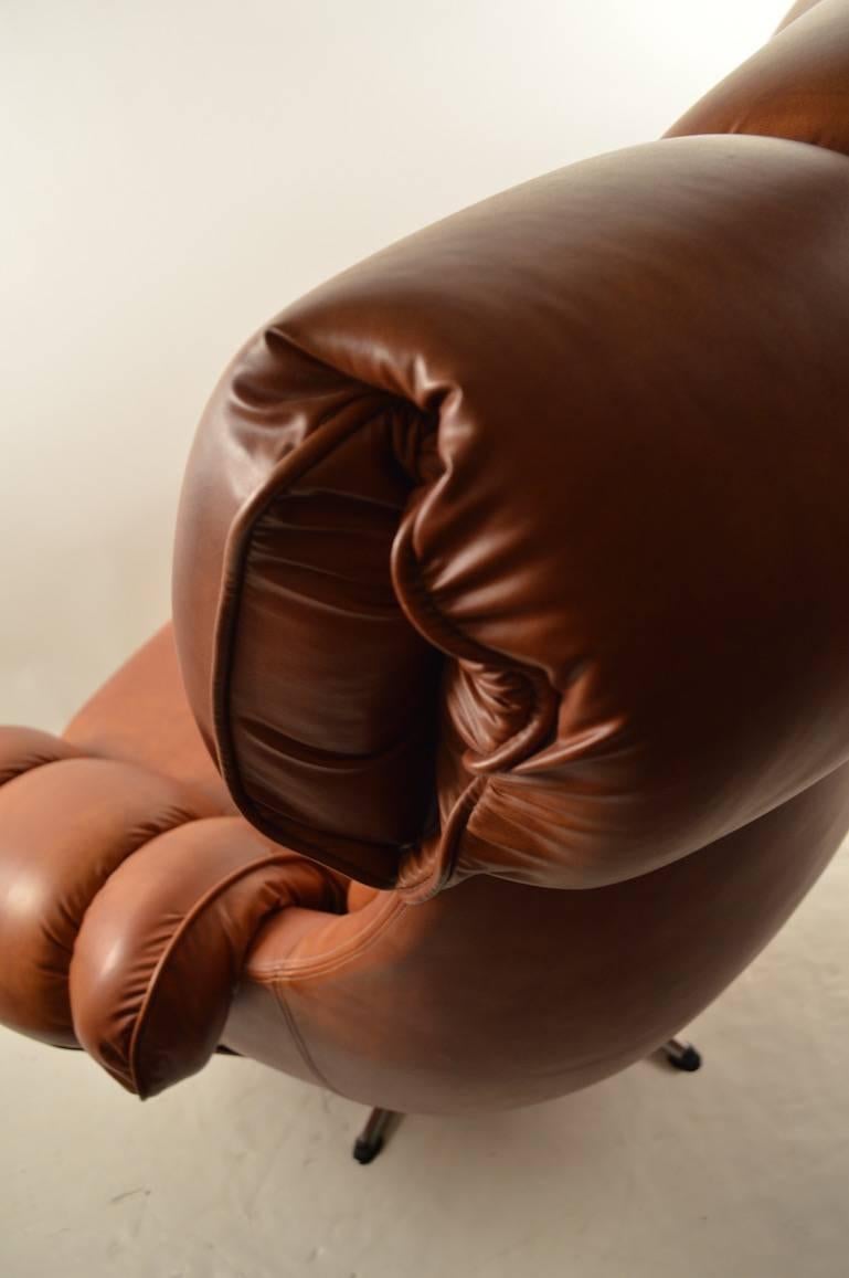 Overstuffed Vinyl Swivel Tilt Lounge Chair In Excellent Condition In New York, NY