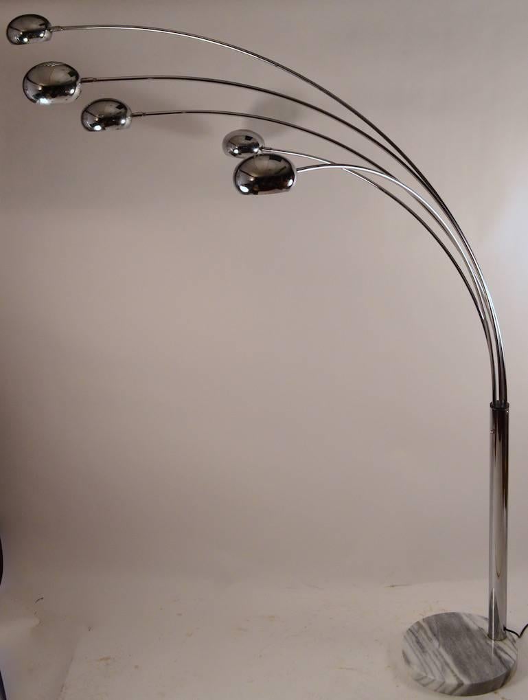 Nice clean chrome and marble floor lamp, five independent and adjustable arms each with a adjustable chrome hood shade. The lamp has three on settings allowing for some or all of the lights to be on at once. Each arm has an approximate projection