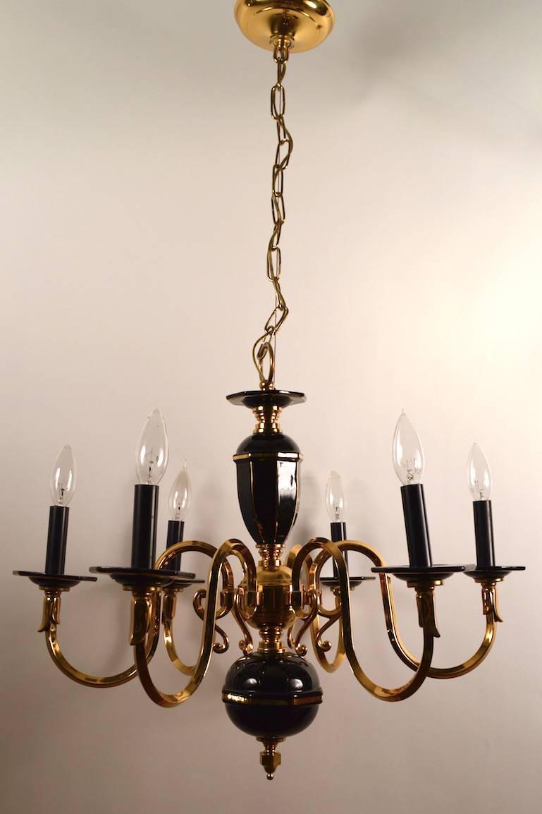 American Six-Light Candle Style Black and Brass Chandelier For Sale