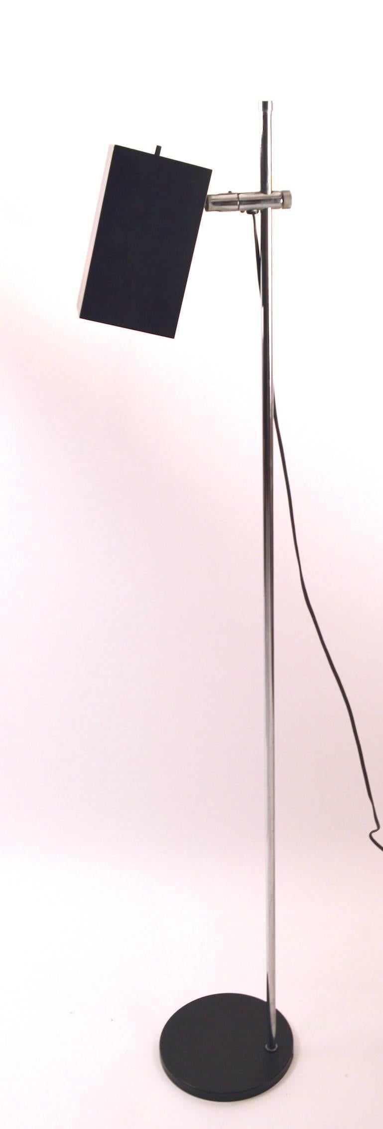 Black and chrome adjustable floor lamp, by Sonneman for Kovacs. The squared hood shade (7