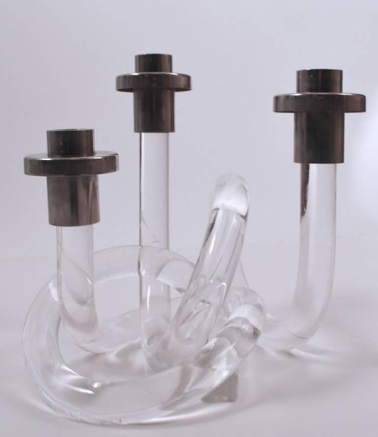 Classic Lucite pretzel three-light candlestick designed by Dorothy Thorpe. Very good original condition, chic and stylish.
