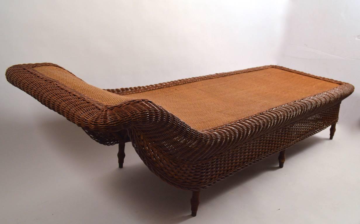 Nice original wicker chaise, daybed, lounge. This example is in very good, original condition showing only very slight signs of age and use. Clean, ready to use condition.